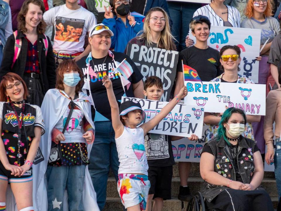 Kansans rally in support of trans rights outside the Kansas statehouse on March 31. Sherman Smith/The Kansas Reflector