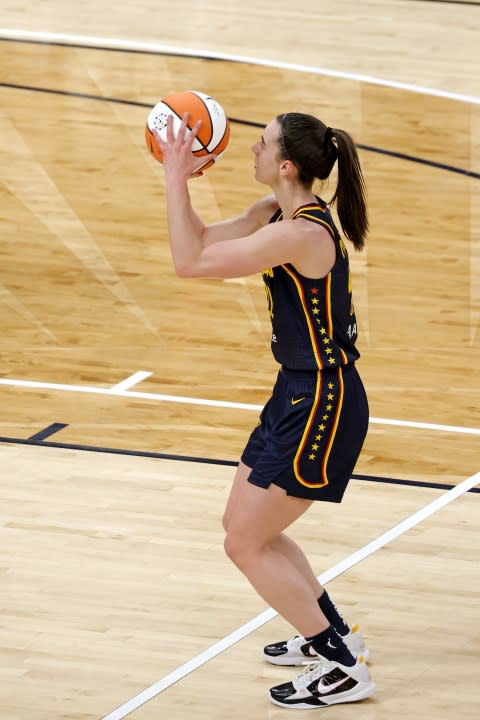 INDIANAPOLIS, IN – MAY 09: Indiana Fever guard Caitlin Clark (22) shoots a free throw against the Atlanta Dream during a WNBA preseason game on May 9, 2024, at Gainbridge Fieldhouse in Indianapolis, Indiana. (Photo by Brian Spurlock/Icon Sportswire via Getty Images)