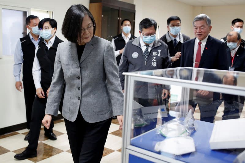 Taiwanese president Tsai Ing-Wen visits a non woven filter fabric factory, where the fabric is used to make surgical face masks, in Taoyuan