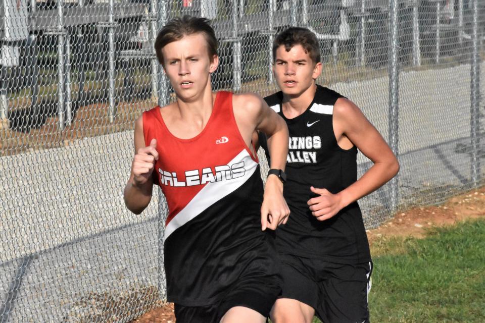 Orleans' Bryce Jones and Springs Valley's Alan Marshall duel during a cross country meet last fall. Both runners qualified for regional at Thursday's BNL Track & Field Sectional as Jones was second in the 1,600 and Marshall placed third in the 800.