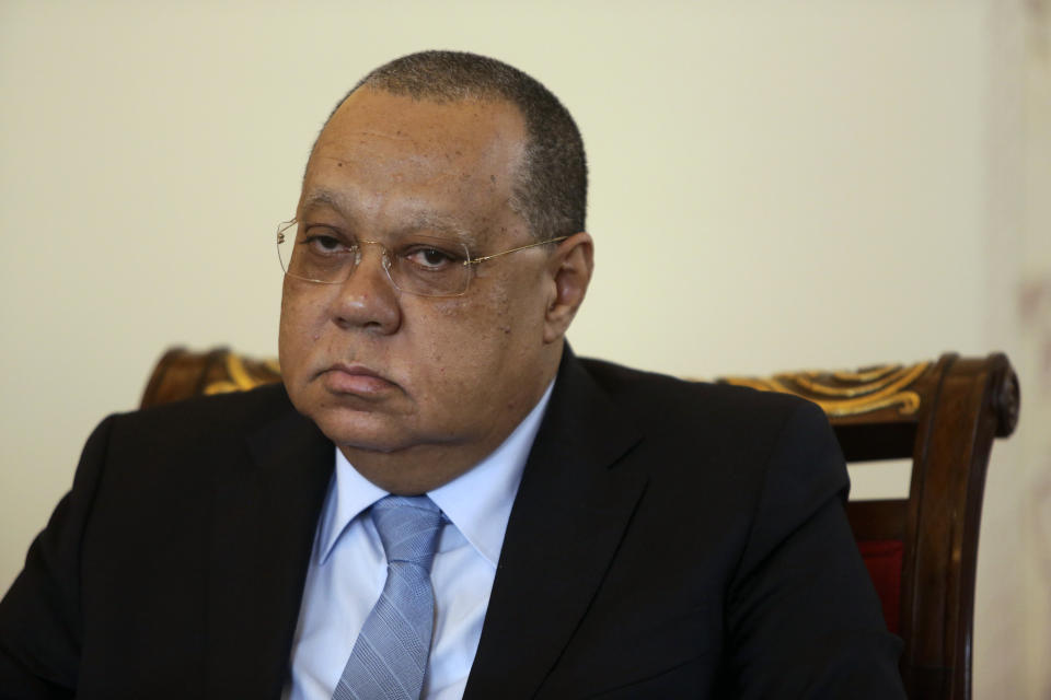 Angolan attorney general Helder Pitta Gros meets with his Portuguese counterpart Lucilia Gago at the Portuguese attorney general's office in Lisbon, Thursday, Jan. 23, 2020. Angola's attorney general arrived Thursday in Portugal to ask for help investigating a major corruption case targeting Isabel dos Santos, the billionaire daughter of Angola's former longtime leader.(AP Photo/Armando Franca)