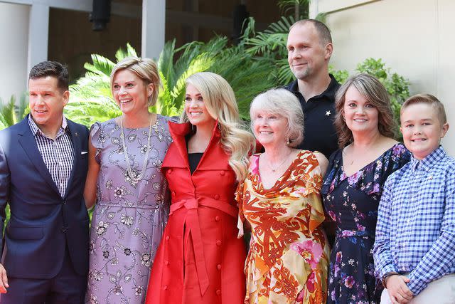 <p>Michael Tran/FilmMagic</p> Carrie Underwood and her family attend the ceremony honoring Carrie Underwood with a Star on The Hollywood Walk of Fame held on September 20, 2018.