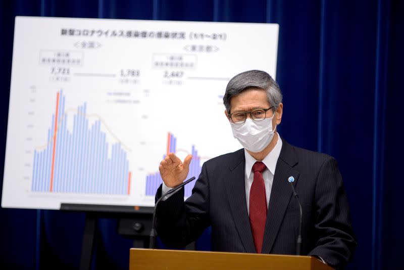 FILE PHOTO: President of the Japan Community Healthcare Organization Shigeru Omi addresses a news conference on the COVID-19 situation, in Tokyo