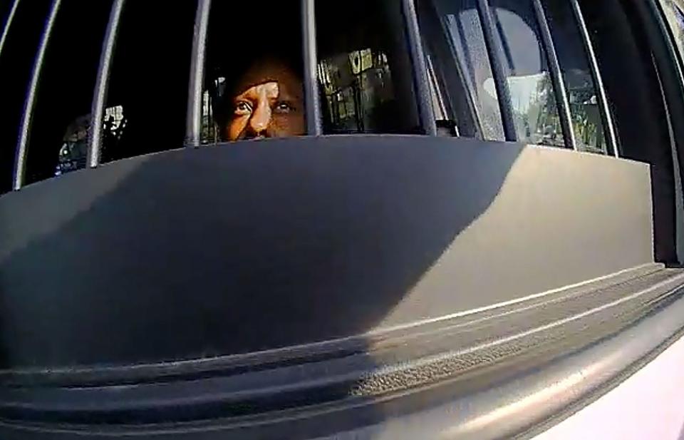 In this frame capture from body camera video, Danasia Neal asks officers if she can have the laptop out of her vehicle while she is detained in the back of a patrol car. Detroit police arrested her after a search during a traffic stop discovered 352 grams of fentanyl and a couple guns in her Range Rover. Neal is trying to get the charges against her thrown out by challenging the officers' authority to pull her over and search her car. Greene and both of the back-seat passengers convinced a Wayne County circuit court judge to throw out the charges against them. Michigan Court of Appeals judges reinstated the charges against the back-seat passengers.