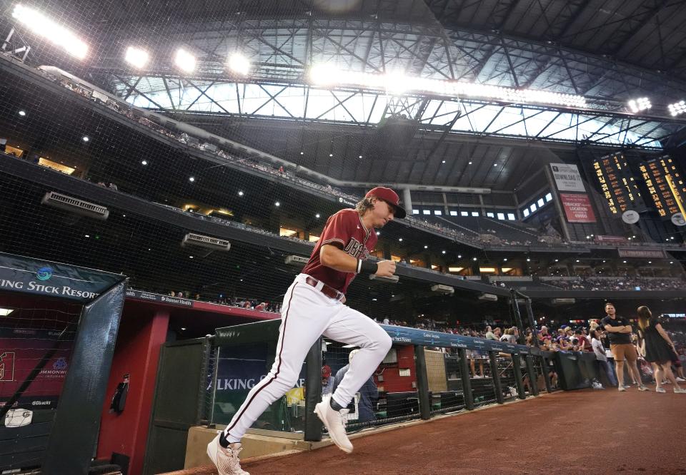 Sept. 4, 2022; Phoenix, AZ, USA; Arizona Diamondbacks’ Jake McCarthy takes the field to warm up before their game against the Milwaukee Brewers at Chase Field.