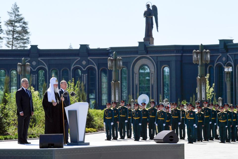 Russian Orthodox Church Patriarch Kirill, center, delivers his speech as Russian President Vladimir Putin, right, and Russian Defense Minister Sergei Shoigu stand near after a religion service marking the 79th anniversary of the Nazi invasion of the Soviet Union, at the Cathedral in the Patriot Park outside Moscow, Russia, Monday, June 22, 2020. The country's new Cathedral of Russian Armed Forces was built and dedicated to the Soviet victory in World War II. (Alexei Nikolsky, Sputnik, Kremlin Pool Photo via AP)