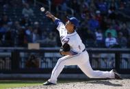 New York Mets reliever Daisuke Matsuzaka delivers in the ninth inning of a 4-1 victory over the St. Louis Cardinals in a baseball game in New York, Thursday, April 24, 2014. (AP Photo/Kathy Willens)