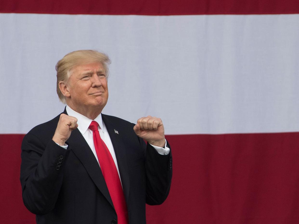 Donald Trump gestures during the National Boy Scout Jamboree at Summit Bechtel National Scout Reserve in Glen Jean, West Virginia, on 24 July 2017