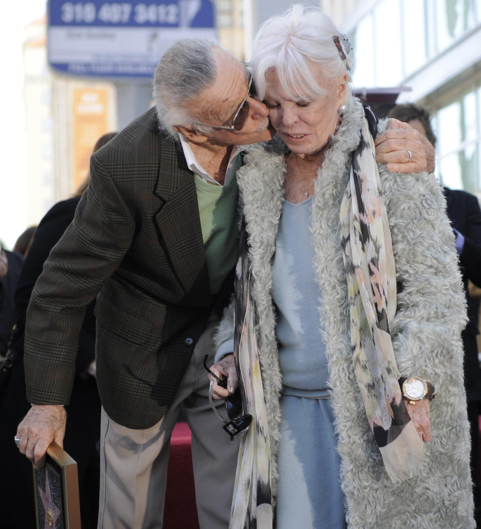 Comic book creator Stan Lee gives his wife, Joan, a kiss after he received a star on the Hollywood Walk of Fame on Jan. 4, 2011.