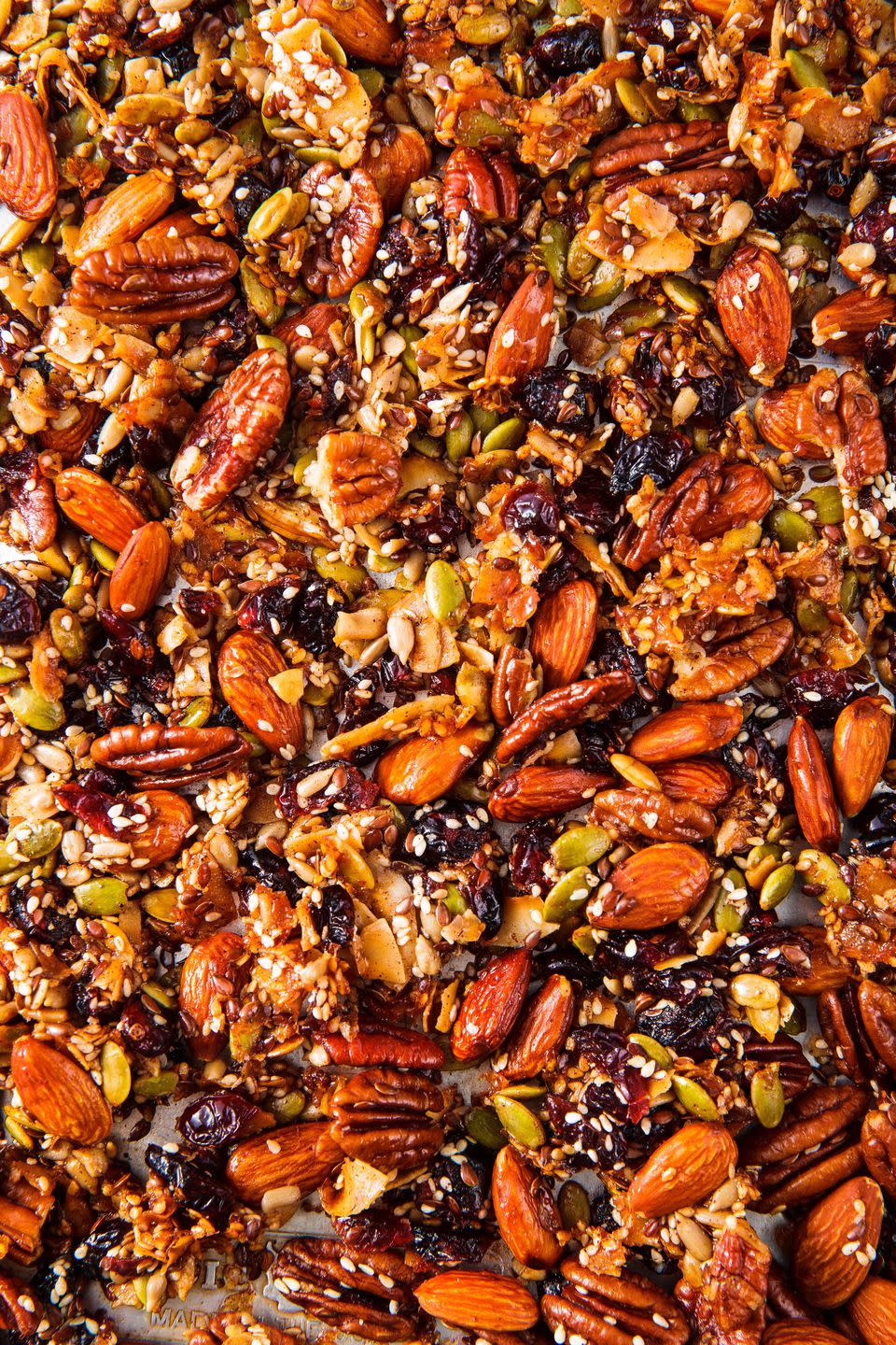 <p>This paleo <a href="https://www.delish.com/cooking/a41910/best-granola-recipe/" rel="nofollow noopener" target="_blank" data-ylk="slk:granola;elm:context_link;itc:0;sec:content-canvas" class="link ">granola</a> gives you your morning carb fix without the grains. We skip the oats, and instead use two whole cups of nuts and 1 1/4 cups of seeds to compensate. For the sweetener, we go with <a href="https://www.delish.com/cooking/recipe-ideas/g40322418/honey-recipes/" rel="nofollow noopener" target="_blank" data-ylk="slk:honey;elm:context_link;itc:0;sec:content-canvas" class="link ">honey</a>, which produces a granola with nice clusters, and coconut oil for the fat.</p><p>Get the <strong><a href="https://www.delish.com/cooking/recipe-ideas/a25429796/paleo-granola-recipe/" rel="nofollow noopener" target="_blank" data-ylk="slk:Paleo Granola recipe;elm:context_link;itc:0;sec:content-canvas" class="link ">Paleo Granola recipe</a></strong>.</p>