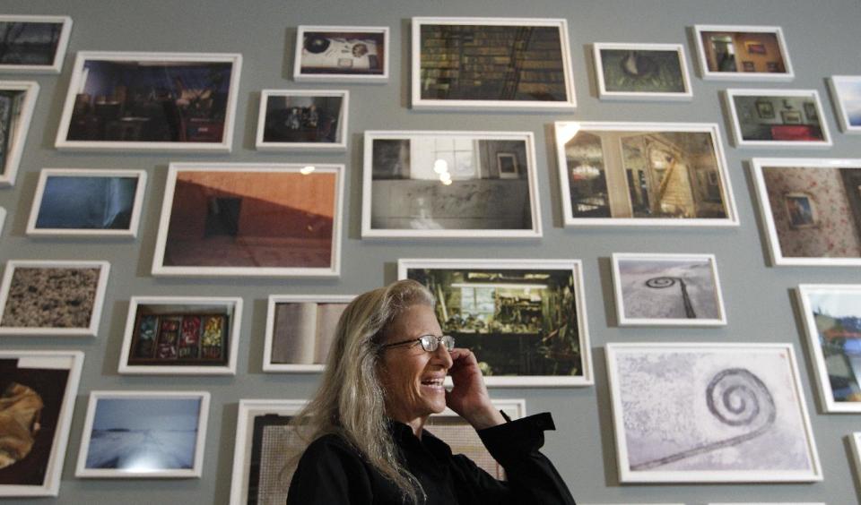 Annie Leibovitz answers questions during an interview before the opening of her exhibition at the Wexner Center for the Arts Friday, Sept. 21, 2012, in Columbus, Ohio. Leibovitz's exhibition features work from her “Master Set,” an authoritative edition of 156 images. (AP Photo/Jay LaPrete)