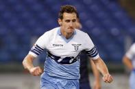 FILE PHOTO: Lazio's Klose celebrates after scoring against Parma in their Serie A soccer match in Rome