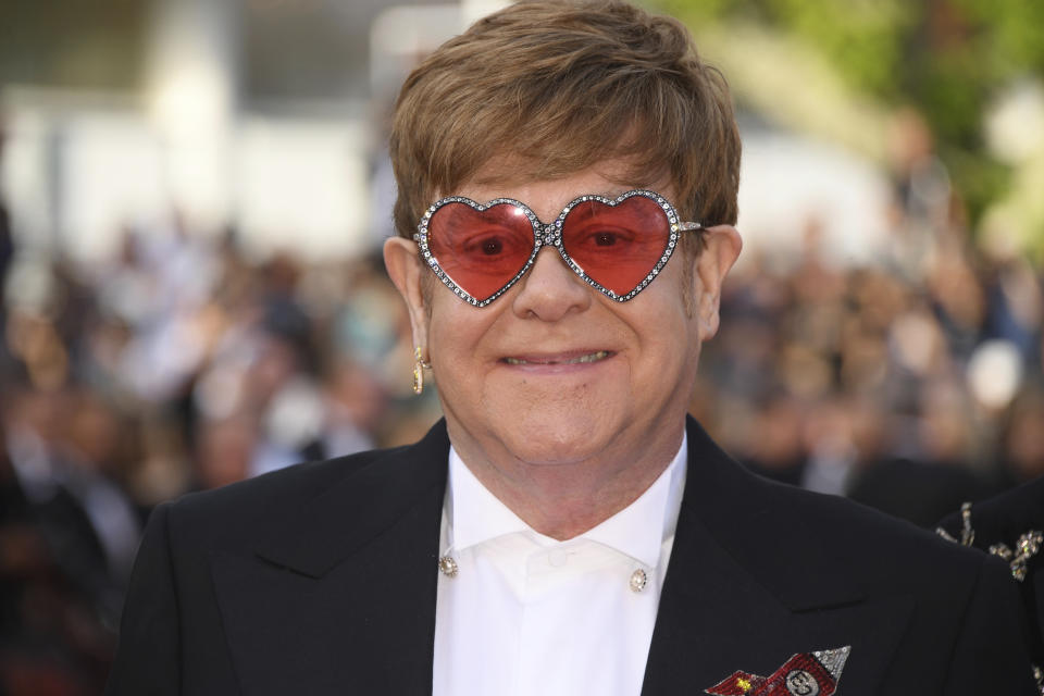 Singer Elton John poses for photographers upon arrival at the premiere of the film 'Rocketman' at the 72nd international film festival, Cannes, southern France, Thursday, May 16, 2019. (Photo by Arthur Mola/Invision/AP)