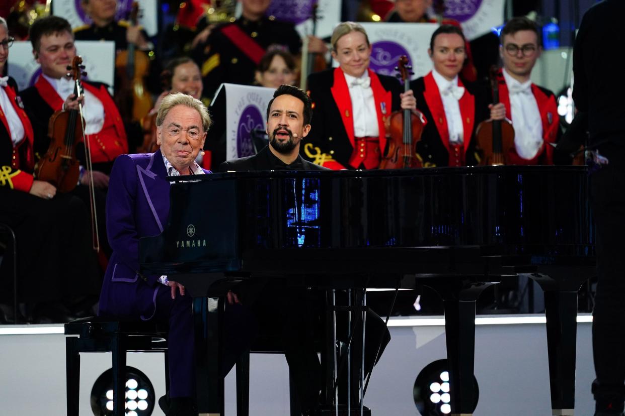 Andrew Lloyd Webber, left, and Lin-Manuel Miranda perform during the Platinum Jubilee concert in front of Buckingham Palace in London on Saturday, June 4, 2022, on the third of four days of celebrations to mark the Platinum Jubilee.