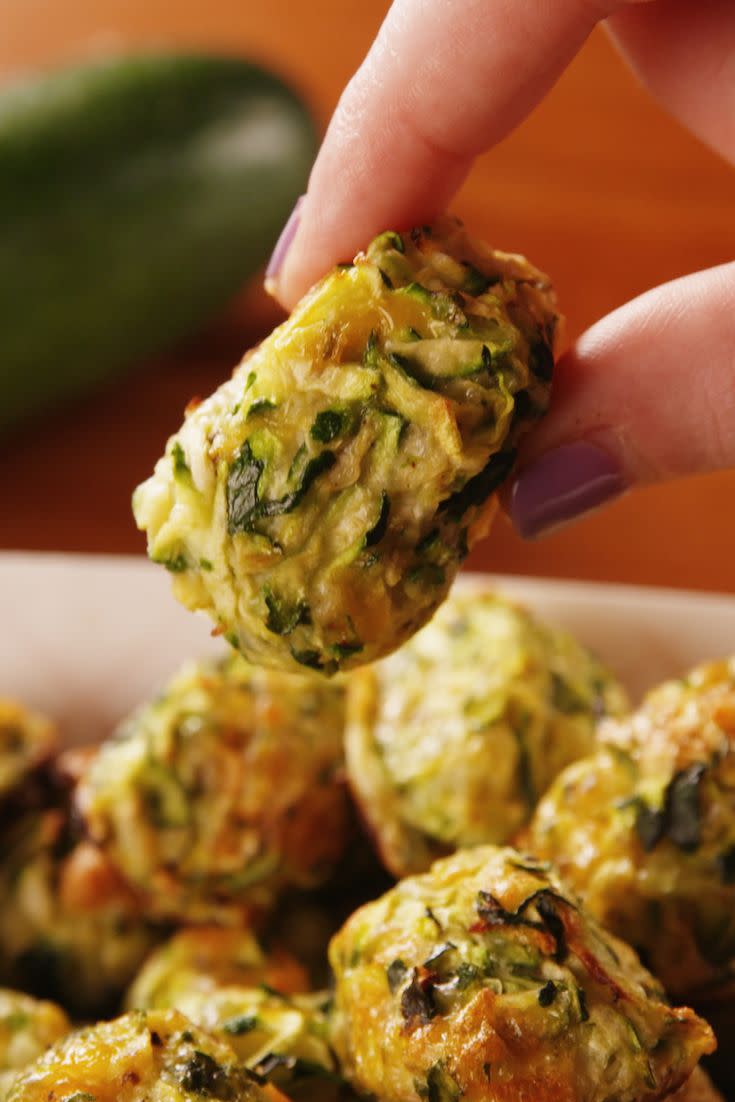 <p>Too tot to handle.</p><p>Get the recipe from <a href="https://www.delish.com/cooking/recipe-ideas/a21602155/zucchini-tater-tots-recipe/" rel="nofollow noopener" target="_blank" data-ylk="slk:Delish" class="link ">Delish</a>.</p>