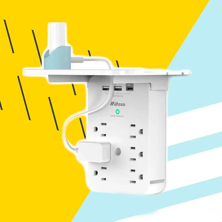 wall outlet extender with shelf