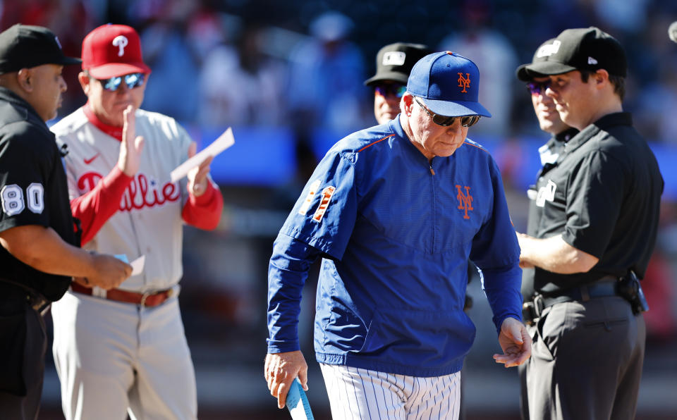 New York Mets manager Buck Showalter walks to the dugout after line up exchange, before the start of baseball game against the Philadelphia Phillies, Sunday, Oct. 1, 2023, in New York. (AP Photo/Noah K. Murray)