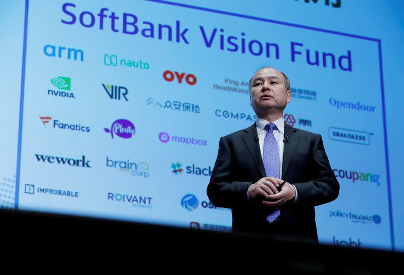 FILE PHOTO: Japan's SoftBank Group Corp Chief Executive Masayoshi Son attends a news conference in Tokyo