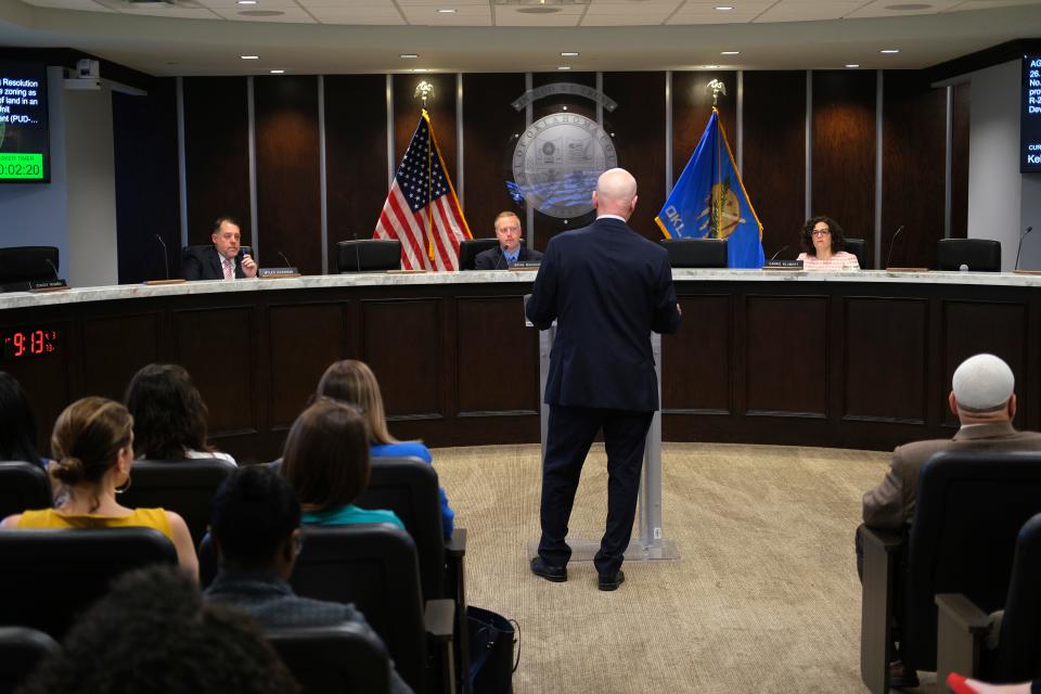 Oklahoma County Commissioners are addressed by a speaker at a meeting in 2023.