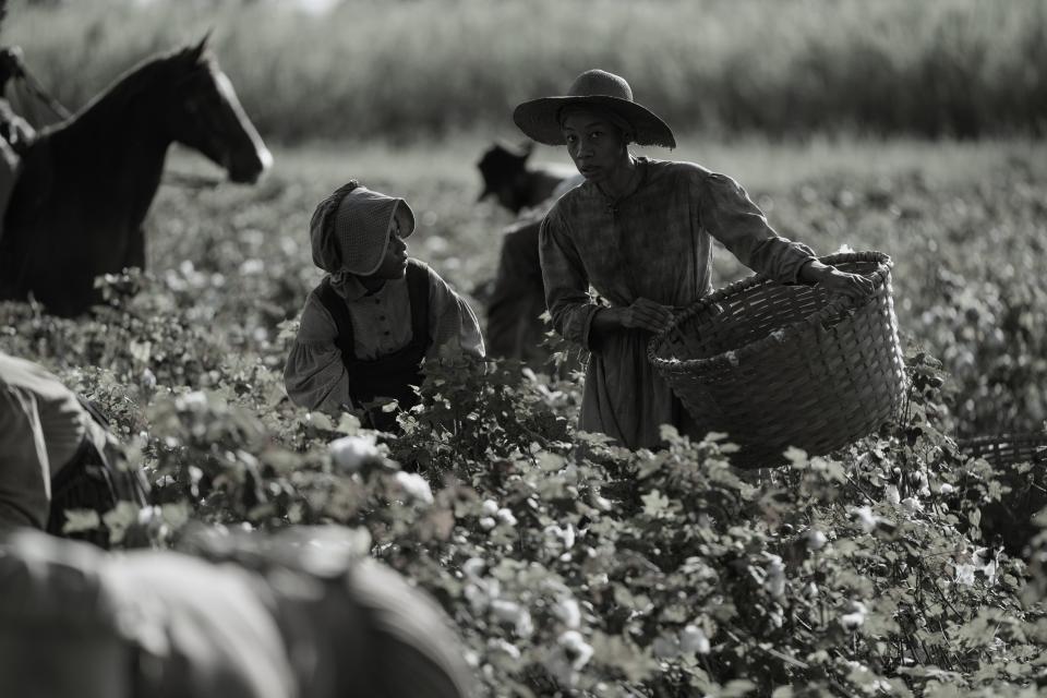 Dodienne (Charmaine Bingwa, right, with Imani Pullum) tries to keep her family safe after her beloved is taken away in the Civil War drama "Emancipation."