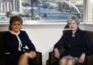 Britain's Prime Minister Theresa May and Scotland's First Minister Nicola Sturgeon meet in a hotel in Glasgow, Scotland, March 27, 2017. REUTERS/Russell Cheyne