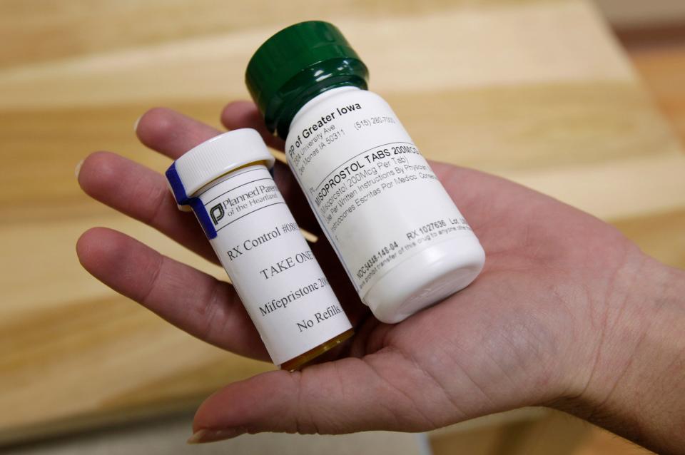 This September 2010 photo shows bottles of the abortion-inducing drug RU-486 at a Planned Parenthood of the Heartland clinic in Des Moines, Iowa, where doctors can remotely prescribe it using a telemedicine terminal. (AP Photo/Charlie Neibergall)