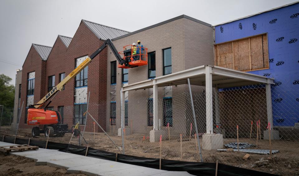 A construction worker for J.S. Vig works on a lift on Thursday, Sept. 7, 2023, at the new Pope Francis Center-Bridge Housing Campus, located in the Core City area of Detroit, that will expand the ability to help house and treat the homeless population.