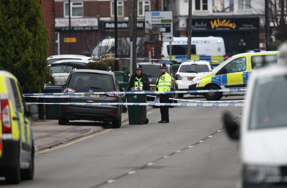 Police near the scene after Sean Fitzgerald was shot (Aaron Chown/PA) (PA Archive)