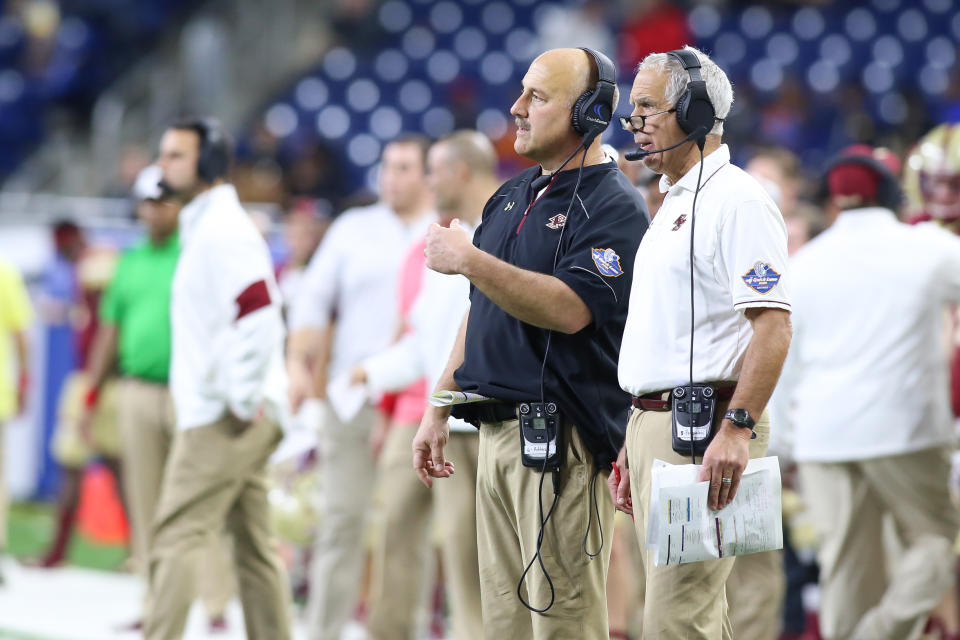 BC head coach Steve Addazio (L) and assistant coach Paul Pasqualoni talk during the Eagles’ bowl game last season. (Getty)