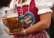 A visitor at a beer tent. Over 6 million revellers are expected to attend the festival.