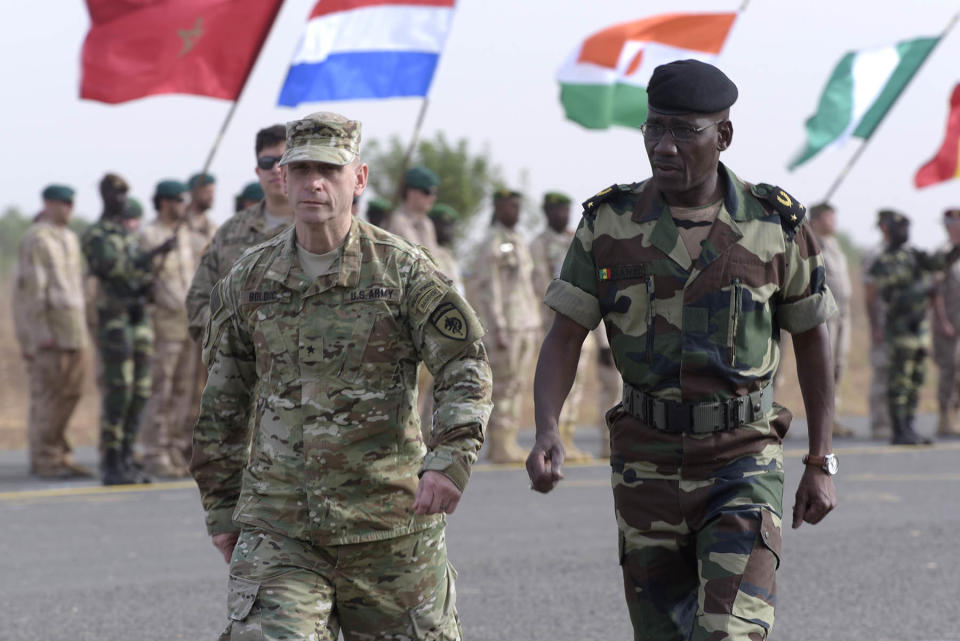 Senegal's Army General Amadou Kane (R) walks with US Army General Donald Bolduc during the inauguration of a military base in Thies, 70 km from Dakar, on February 8, 2016 on the second day of a three-week joint military exercise between African, US and European troops, known as Flintlock.
Some 1,700 members of the special forces from nearly thirty countries from Africa, America and Europe, including France and Britain, are taking part in military exercises from February 8-29 according to AFRICOM, the military command of the USA for Africa. / AFP / SEYLLOU        (Photo credit should read SEYLLOU/AFP via Getty Images)