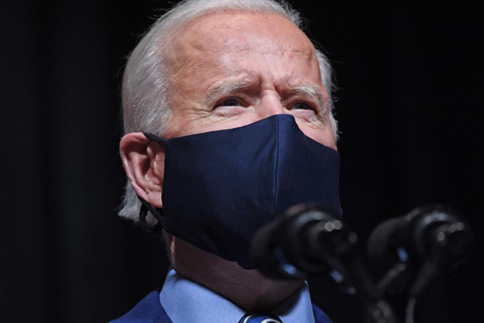 President Joe Biden speaks during a visit to the National Institutes of Health (NIH) in Bethesda, Maryland, Feb. 11, 2021.