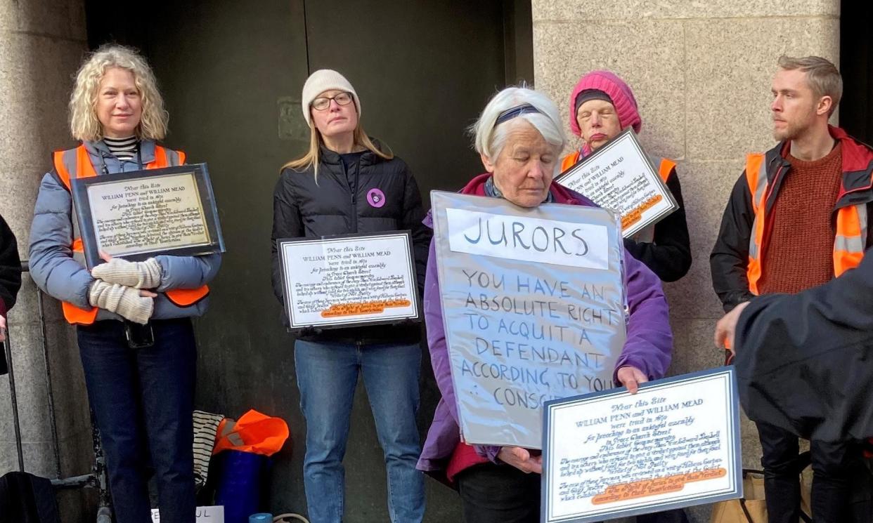 <span>Trudi Warner, 68, (third from left) from Walthamstow, east London, and supporters holding up signs outside the Old Bailey in central London last year.</span><span>Photograph: Emily Pennink/PA</span>