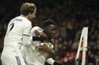 Leeds United's Wilfried Gnonto, right, celebrates after scoring the opening goal of the game during the English Premier League soccer match between Manchester United and Leeds United at Old Trafford in Manchester, England, Wednesday, Feb. 8, 2023. (AP Photo/Dave Thompson)
