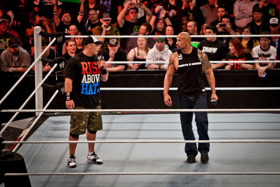 John Cena and The Rock in the ring.