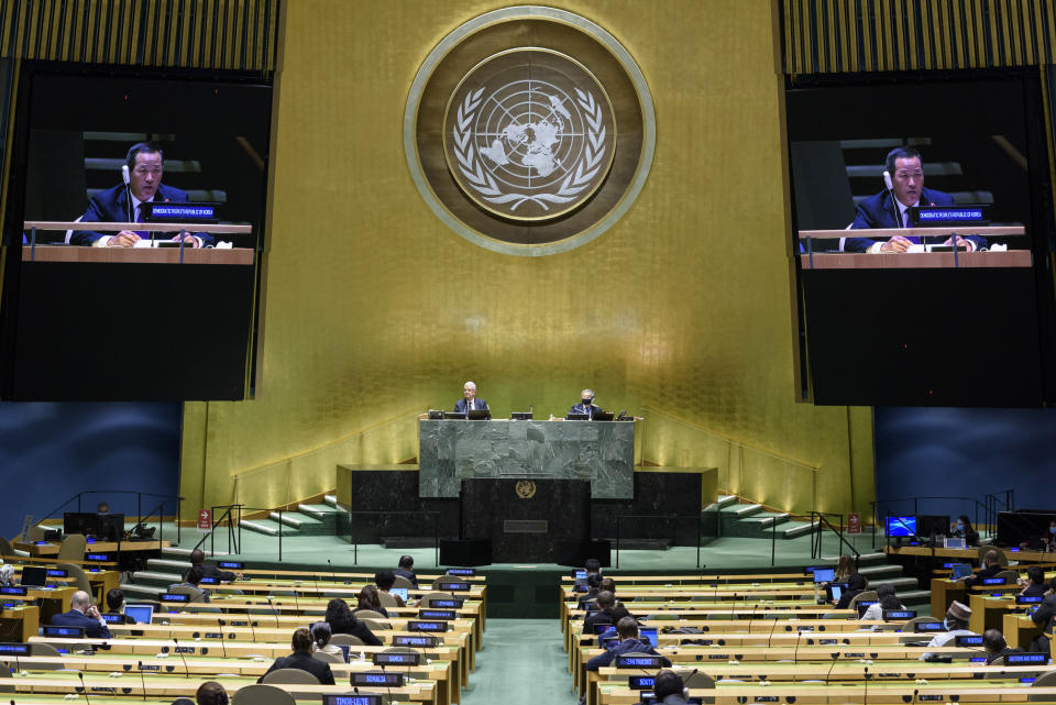 In this UN Photo, Kim Song, permanent representative of the Democratic People's Republic of Korea (DPRK) to the United Nations, is shown on video monitors as he speaks in person, during the 75th session of the United Nations General Assembly, Tuesday, Sept. 29, 2020, at U.N. headquarters. (Loey Felipe/UN Photo via AP)