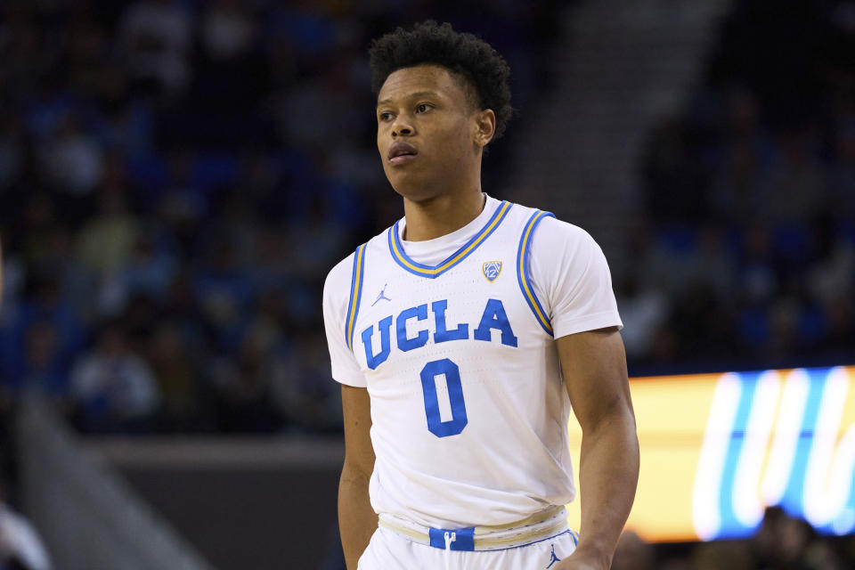 UCLA guard Jaylen Clark walks down the court during the first half of the team's NCAA college basketball game against California on Saturday, Feb. 18, 2023, in Los Angeles. (AP Photo/Allison Dinner)