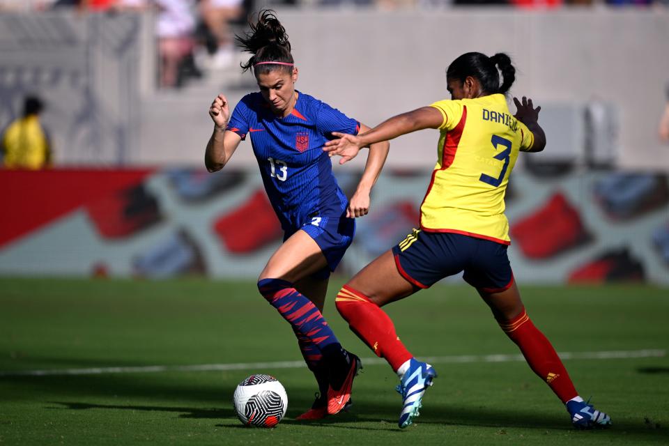 Oct 29, 2023; San Diego, California, USA; United States forward Alex Morgan (13) and Colombia defender Daniela Arias (3) battle for the ball during the first half at Snapdragon Stadium. Mandatory Credit: Orlando Ramirez-USA TODAY Sports