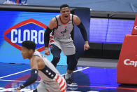 Washington Wizards guard Russell Westbrook (4) reacts after he made a basket during the second half of an NBA basketball game against the Minnesota Timberwolves, Saturday, Feb. 27, 2021, in Washington. (AP Photo/Nick Wass)