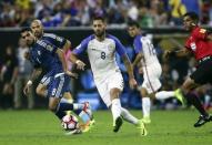 Jun 21, 2016; Houston, TX, USA; United States midfielder Clint Dempsey (8) passes the ball during the first half against Argentina in the semifinals of the 2016 Copa America Centenario soccer tournament at NRG Stadium. Troy Taormina-USA TODAY Sports