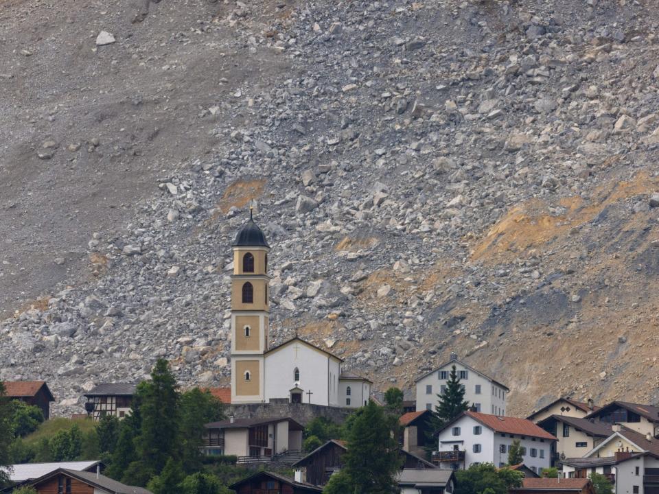 A Swiss village evacuated because of rockslide danger was spared "by a hair" when part of the mountain towering above the hamlet crashed down overnight, local officials said on June 16, 2023.