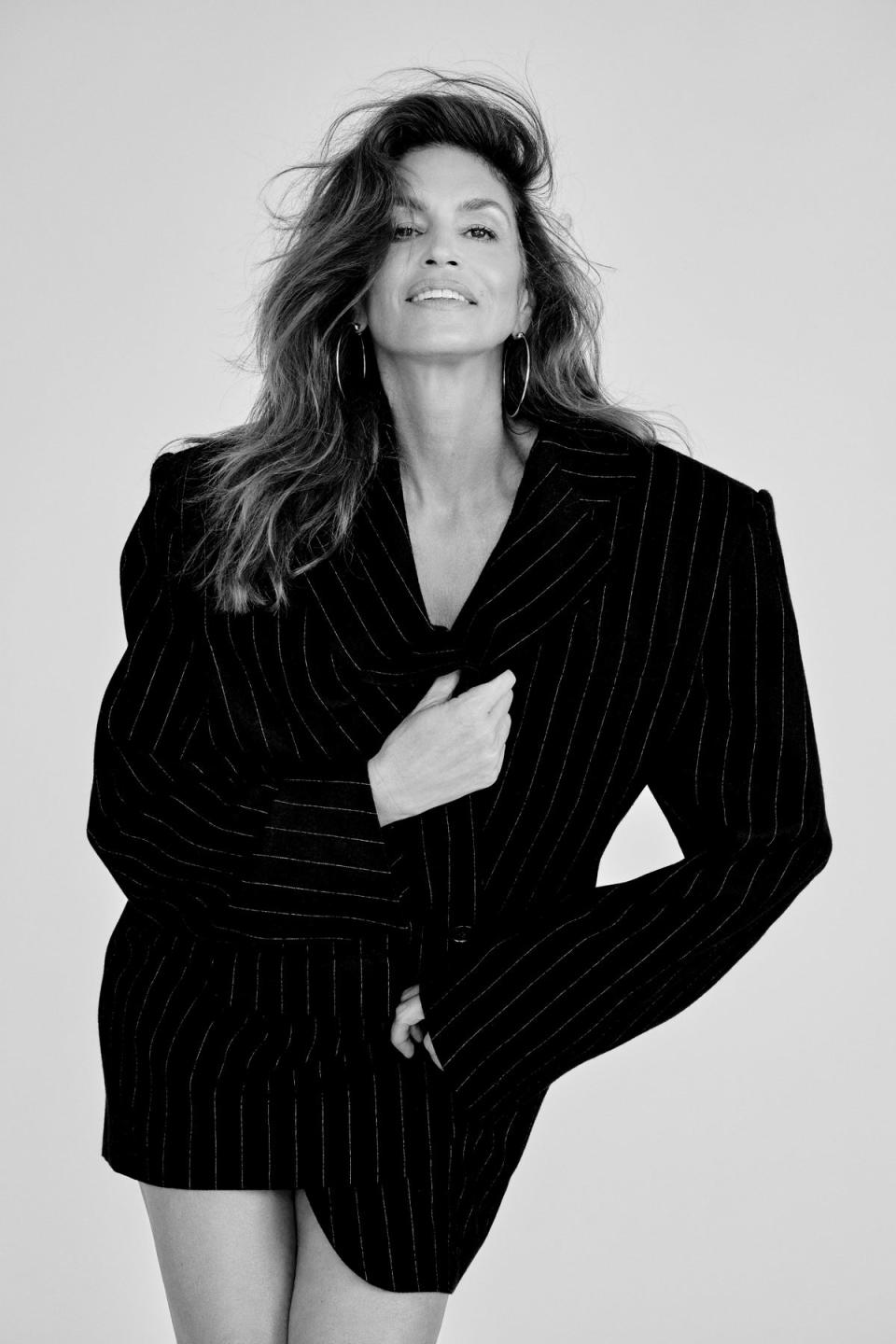 Cindy Crawford shot by Yu Tsai for ES Magazine .REVLON ColorStay Micro Brow Pencil in Soft Brown, £8.99, at boots.com. HOURGLASS COSMETICS Voyeur Waterproof Gel Eyeliner in Cave, £27 (hourglasscosmetics.co.uk) SAINT LAURENT single-breasted wool jacket,£3,410; earrings, POA (both ysl.com)