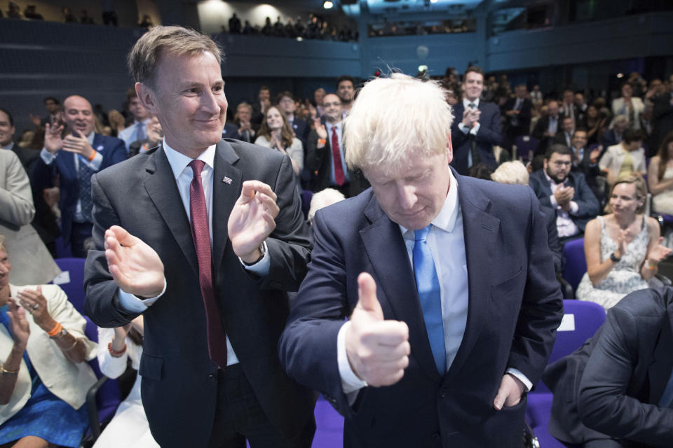 FILE - Jeremy Hunt, left, congratulates Boris Johnson after the announcement of the result in the ballot for the new Conservative party leader, in London, July 23, 2019. Revelations that Prime Minister Boris Johnson and his staff partied while Britain was in a coronavirus lockdown have provoked public outrage and led some members of his Conservative Party to consider ousting their leader. If they manage to push Johnson out — or if he resigns — the party would hold a leadership contest to choose his replacement. Hunt, a former health secretary and foreign secretary, ran against Johnson in the 2019 leadership race, billing himself as the more sensible, serious candidate. He lost heavily, and was dumped from the Cabinet when Johnson took over. (Stefan Rousseau/Pool photo via AP, File)