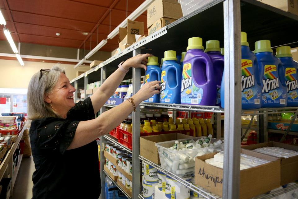 Administrative Assistant Jennifer Messier checks on inventory at St. Vincent De Paul Community Assistance Center on Monday, Sept. 12, 2022 in Exeter.