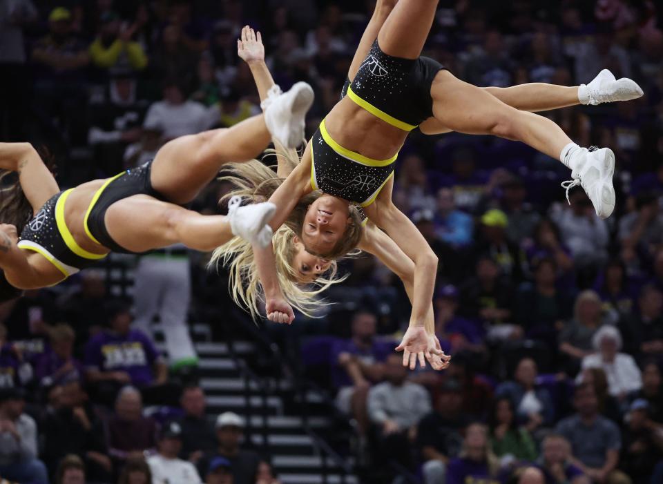 Utah Jazz Dancers fly through the air during a timeout in Salt Lake City on Wednesday, Oct. 25, 2023. The Kings won 130-114. | Jeffrey D. Allred, Deseret News