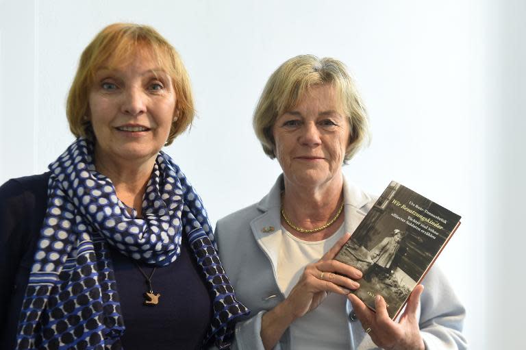 Margot Jung (left) and Ute Baur-Timmerbrink -- two so-called "children of the occupation" -- answer questions during a press conference to present Baur-Timmerbrink's book "Wir Besatzungskinder" ("we, children of war")