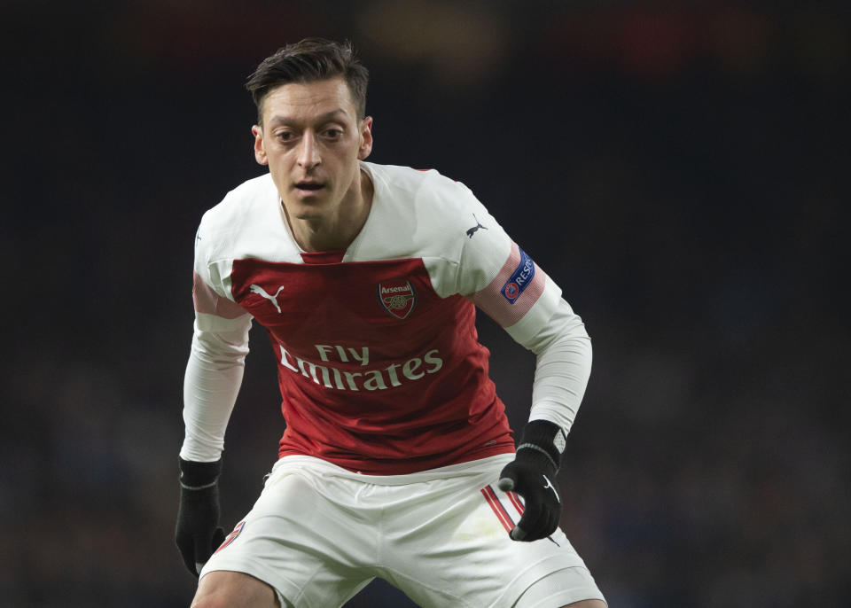 Mesut Ozil in action for Arsenal (Photo by TF-Images/Getty Images)