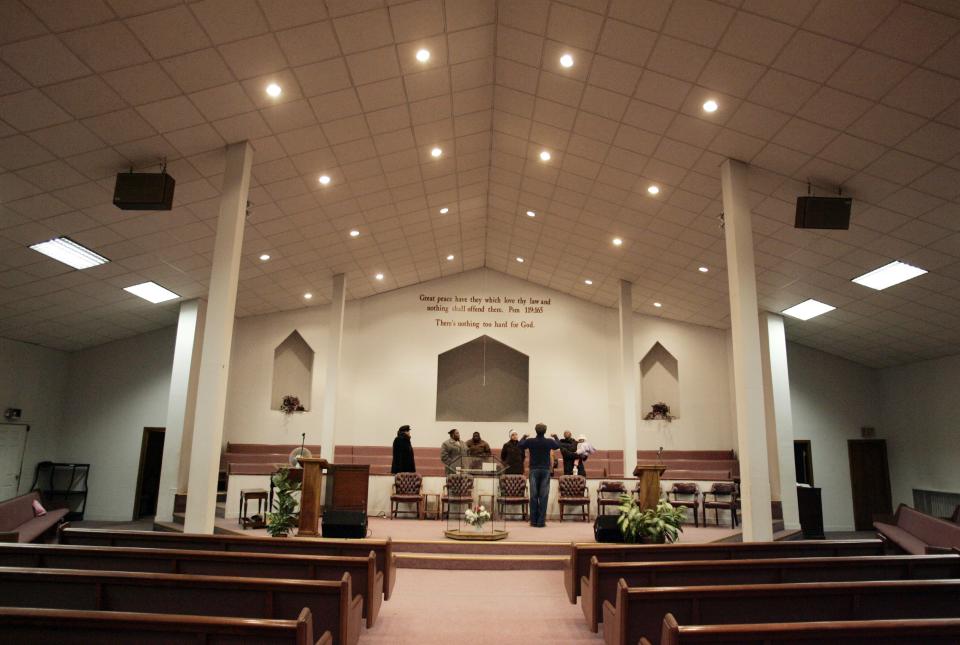 Parishioners gather for choral practice at Roberts Temple Church of God in Christ, Wednesday, Nov. 16, 2005, on Chicago's South Side.