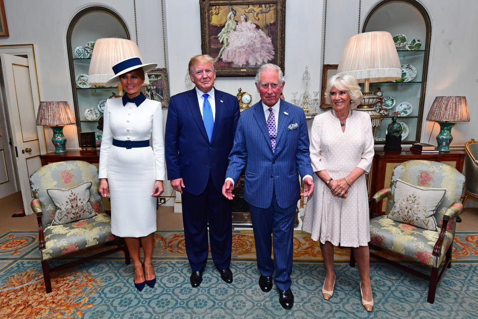 US President Donald Trump and his wife Melania (left) at Clarence House in London to take tea with the Prince of Wales and Duchess of Cornwall on the first day of his state visit to the UK.