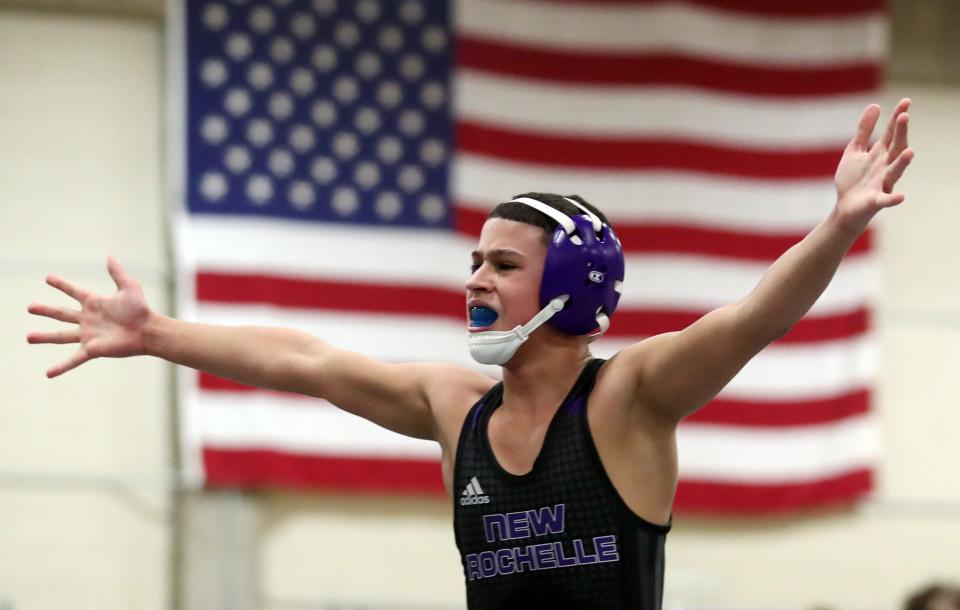 New Rochelle's Fotis Koufalis and Yonkers Will Miller wrestle in the 101-pound weight class during the Westchester County wrestling championship at Yonkers High School Jan. 20, 2024. Koufalis won the match.